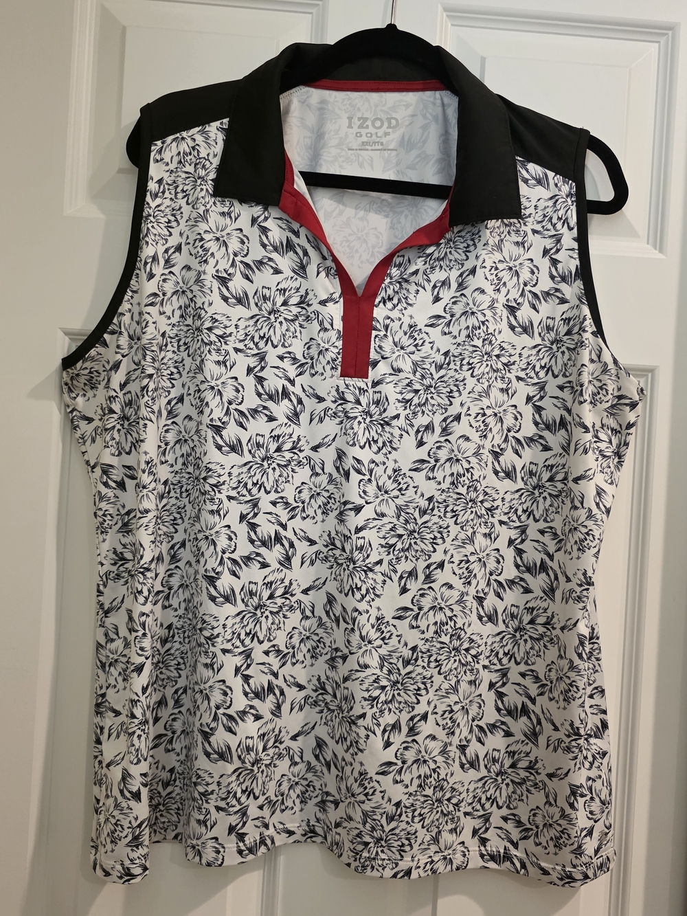 Izod Women’s Sleeveless Floral Polo Top in White, Black and Red Trim